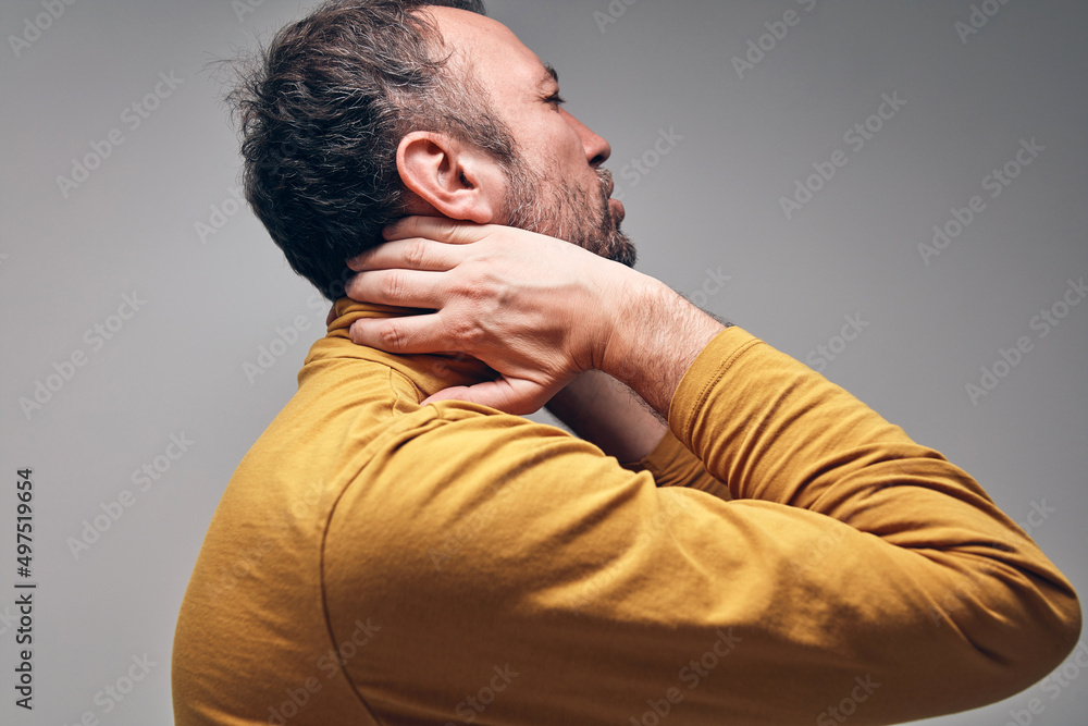 Adult caucasian man with neck pain, injury, herniated disk. Adult caucasian man with neck pain, injury, herniated disk.