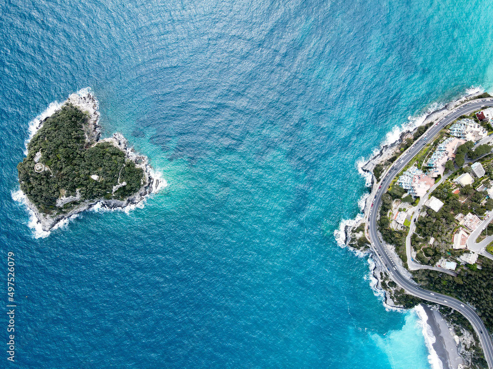 Aerial view of Bergeggi island, heart island from above, in Liguria, north Italy. Drone photography of the Ligurian coast, province of Savona with Spotorno and the island of Bergeggi.