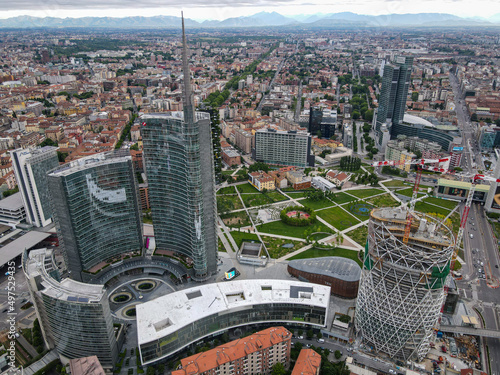 Milan, Italy - May 08, 2021: Aerial view of Milan Porta Nuova district, city skyline, business buildings and skyscrapers of Palazzo Regione Lombardia, Unicredit Tower, Bosco Verticale in Lombardy. photo