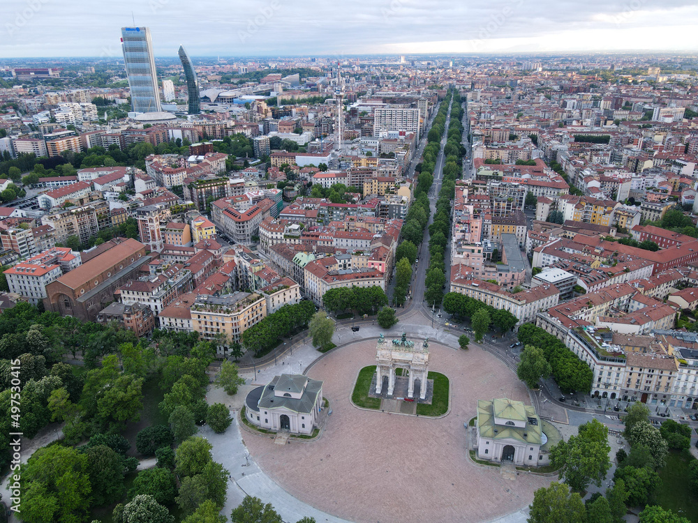 Fototapeta premium Aerial view of Arco della Pace in Milano, north Italy. Drone photography of Arch of Peace in Piazza Sempione, near Sempione park in the heart of Milan, Lombardy and Sforza Castle.
