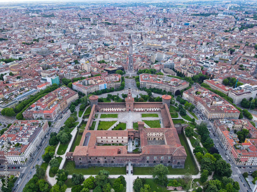 Aerial view of Castello Sforzesco (Sforza castle) in Milan. Drone photography in Lombardia. Historic medieval Sforza fortress and Arco della Pace in Sempione park, north Italy, in Europe.