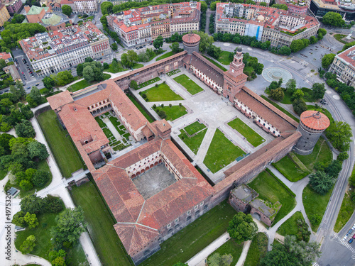 Aerial view of Castello Sforzesco (Sforza castle) in Milan. Drone photography in Lombardia. Historic medieval Sforza fortress and Arco della Pace in Sempione park, north Italy, in Europe. © AerialDronePics