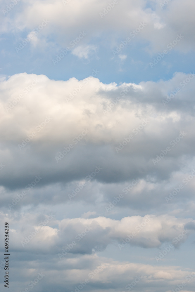 Cover page with soft blue sky with illuminated clouds as a background. Cover page with soft blue sky with illuminated clouds as a background.