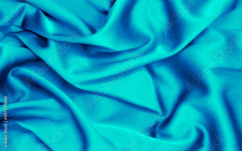 closeup of rippled blue silk fabric