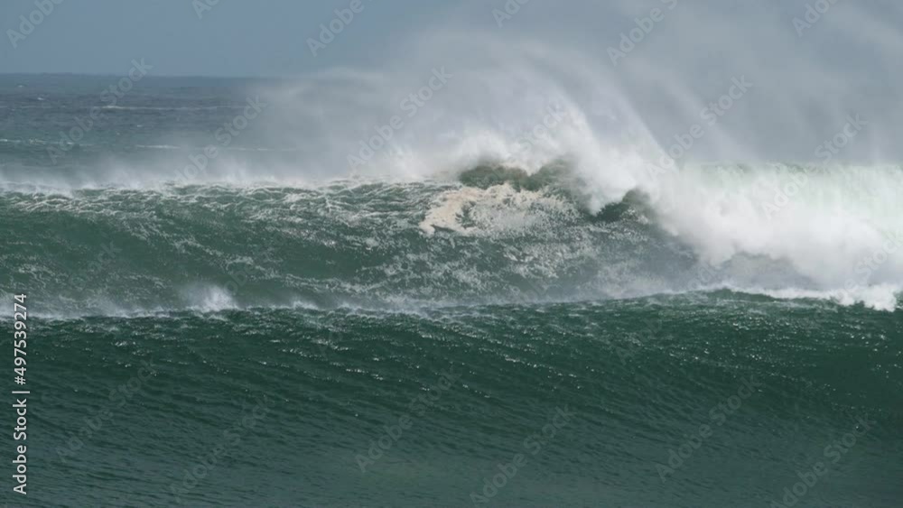 Surfers paddle over huge wave and bail Surfers paddle over huge wave and bail