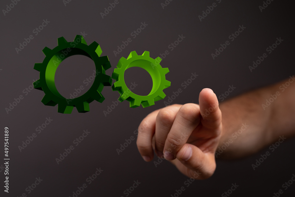 Set of green gears and cogs on black background Set of green gears and cogs on black background