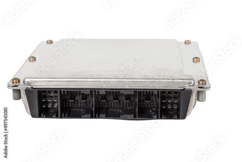 A metall car engine control unit with metal elements on a white isolated background is the connecting center of various subsystems, units and assemblies. Spare part for repair in a auto service
