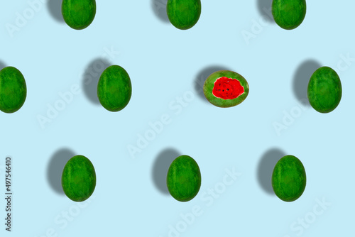 break the pattern, easter egg painted like watermelon, copied watermelon egg all over the background and one open watermelon, creative summer easter design