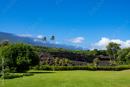 Ancient ruins of the Pi'ilanihale Heiau Temple in the tropical landscape of Kahanu Garden, Hana, Maui photo