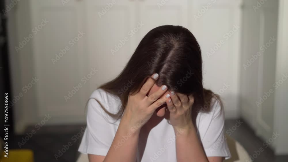 Young woman holding head. Female with headache. Person feel pain, touch face. Migraine or stressed worried girl. Young woman holding head. Female with headache. Person feel pain, touch face. Migraine or stressed worried girl.