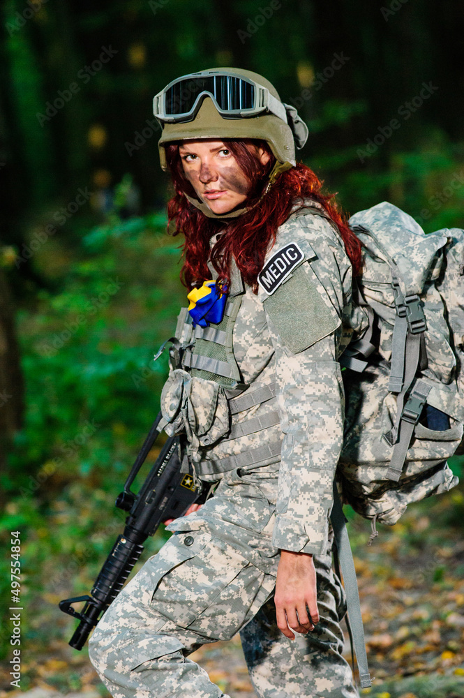 Ukranian female soldier in the forest Ukranian female soldier in the forest