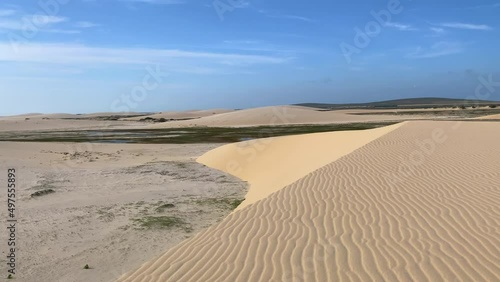 Appreciating a scenic sand dune view in Jericoacoara, Brazil