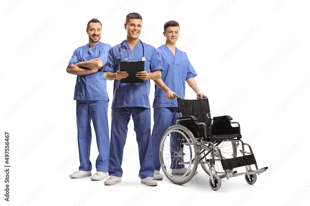 Male health care workers in blue uniforms with a wheelchair Male health care workers in blue uniforms with a wheelchair