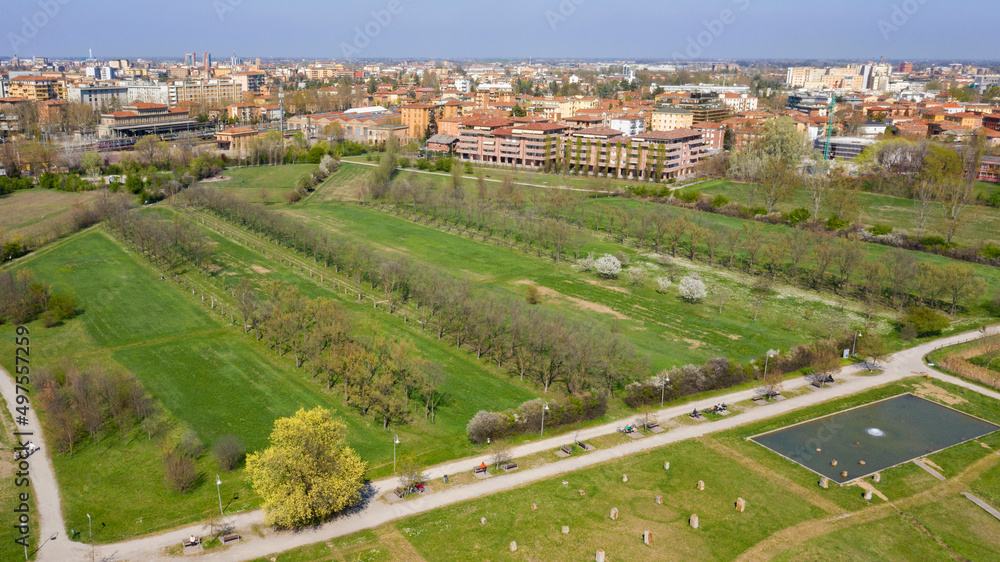 Aerial view of the Resistance park in Modena, Italy. In the background you can see the city and in particular the Ghirlandina tower.