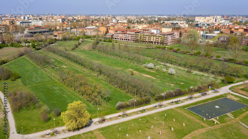 Aerial view of the Resistance park in Modena, Italy. In the background you can see the city and in particular the Ghirlandina tower.