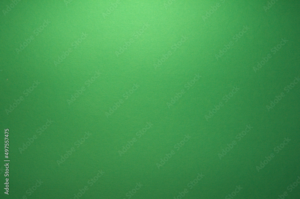 Green background. Light gradient. Texture on the background. Green background. Light gradient. Texture on the background.