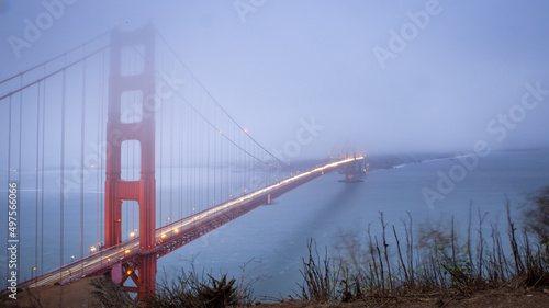 Photography Landscape of the Golden Gate Bridge covered in the fog in San Francisco, Califor
