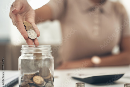Storing a few extra pennies into the money jar