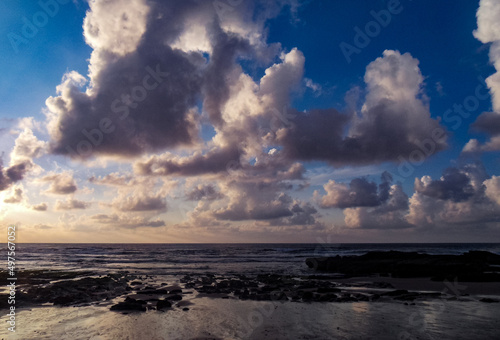 Scenic view of the Monte Clerigo Beach in Algarve, Portugal at sunset
