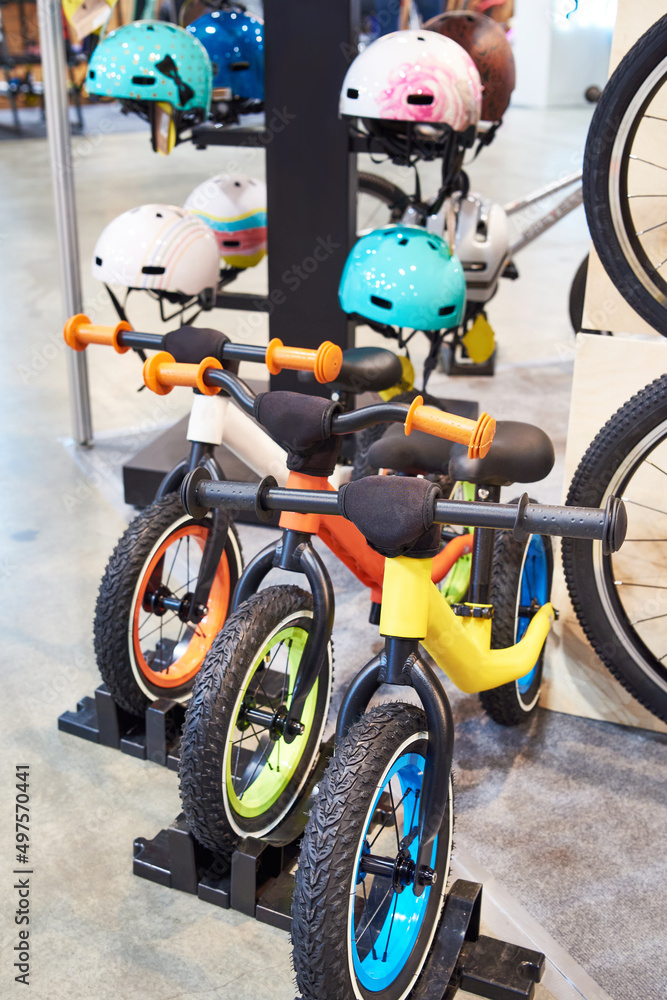 Obraz premium Children bicycles and helmets in sport store