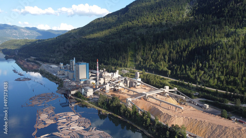 Aerial view of the factory of pulp production near the hills on the river in Castlegar photo