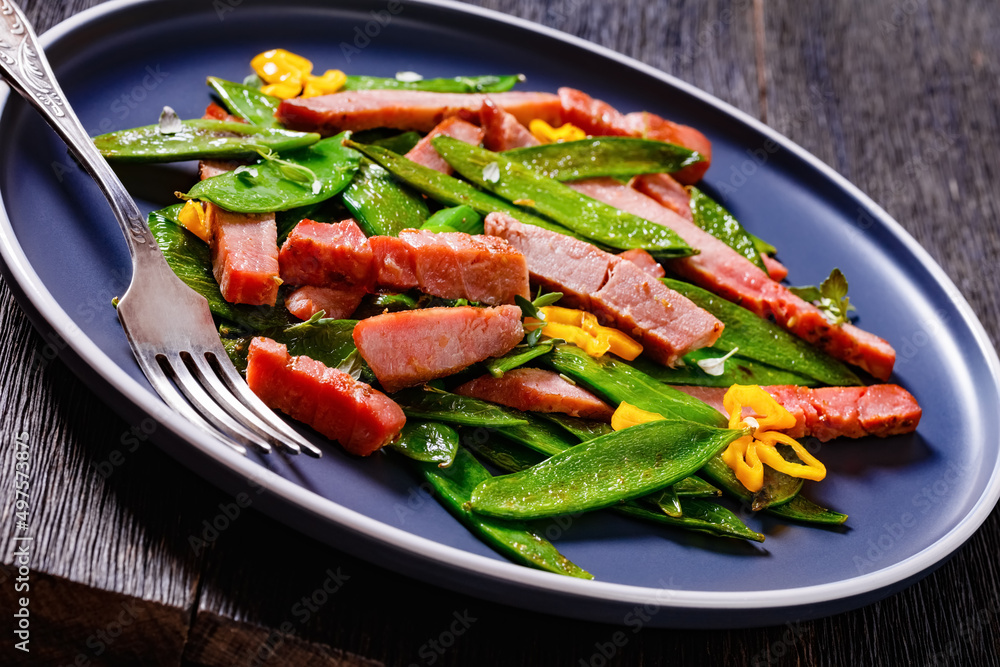fried sugar snap peas with tuna slices fried sugar snap peas with tuna slices