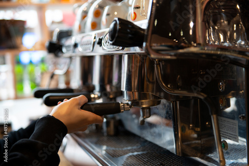 Barista making coffee at a coffee shop