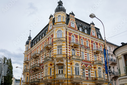 Marianske lazne  Czech Republic  7 August 2021  Romantic architecture of Bohemia  spa city Marienbad  colorful houses with beautiful facades of wellness hotel at sunny summer day  cultural monument