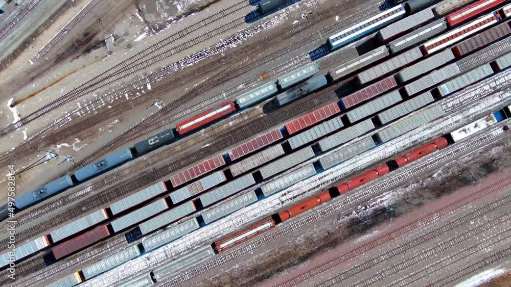 0004456672-C freight train rolling into industrial area 0004456672-C freight train rolling into industrial area