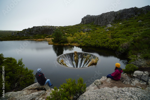 Covao dos Conchos famous for its Bell-mouth spillway in Serra da Estrela mountains, Portugal photo
