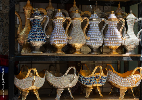 Fotografie Bunch of Turkish handmade swarovski crystals coated copper teapot pitcher