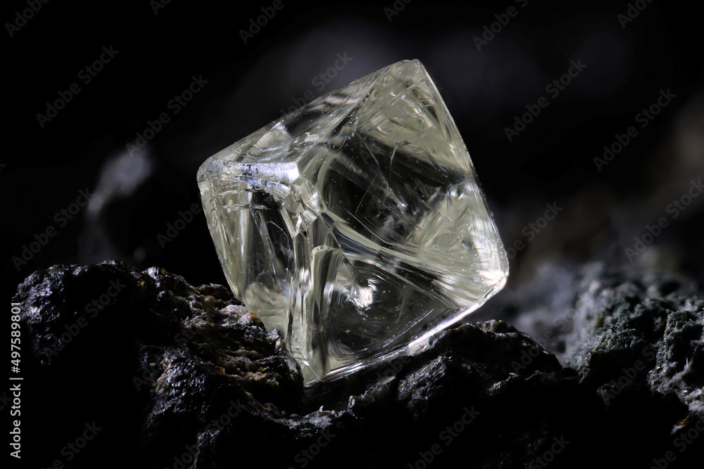 0.55 ct octahedral diamond from South Africa nestled in kimberlite 0.55 ct octahedral diamond from South Africa nestled in kimberlite