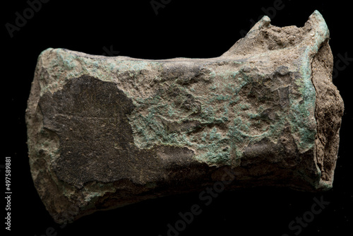 Closeup shot of Bronze age ax found with a metal detector photo