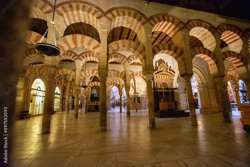 Medieval moorish architecture, colorful achways with columns in old mosque in Cordoba with no people, Andalusia, Spain