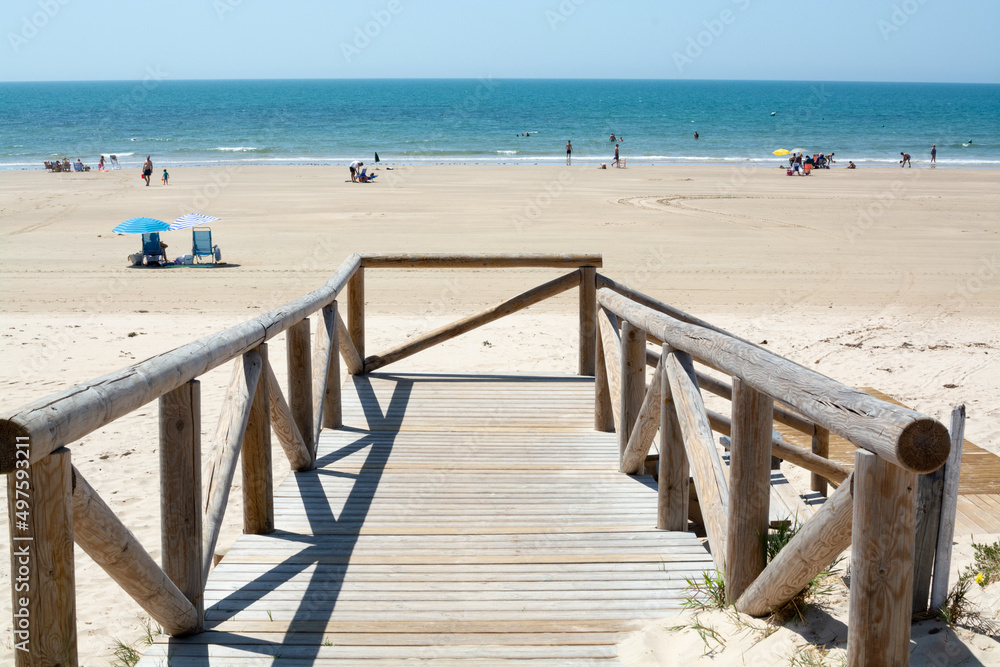 Fototapeta premium Golden sandy beaches near Sanlucar de Barrameda, small Andalusian town, Spain