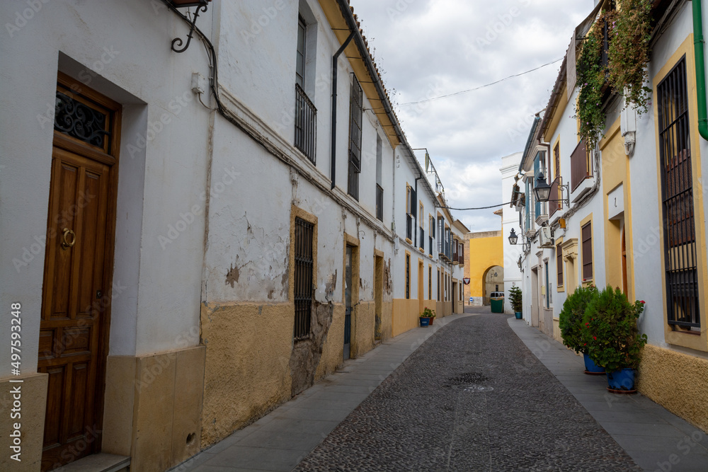 View on old part of Cordoba, San Basilio quarter with white houses and flowers pots