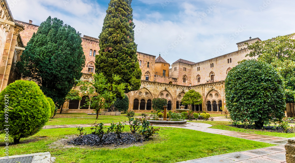A view across a courtyard in the cathedral in the city of Tarragona on a spring day