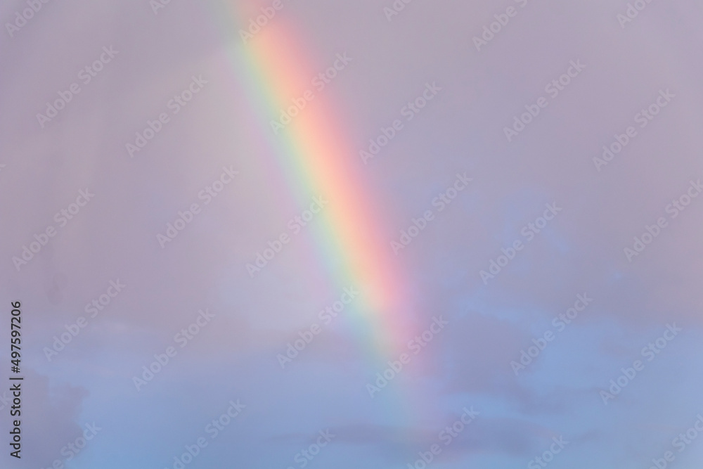 Rainbow on the cloudy pink sky Rainbow on the cloudy pink sky