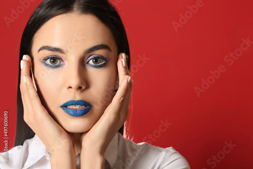 Beautiful young woman with ...