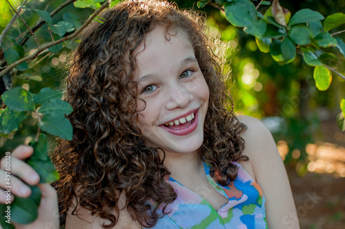 Portrait of beautiful curly hair girl