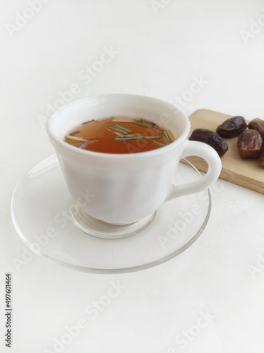 Fototapeta Naklejka Na Ścianę i Meble -  herbal tea with dried lemongrass and dried dates