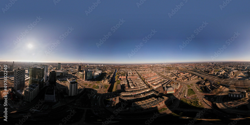 Full 360 degrees aerial panorama of Utrecht central train station and financial district area in the morning with Lombok neighbourhood. Equirectangular projection ready for VR.