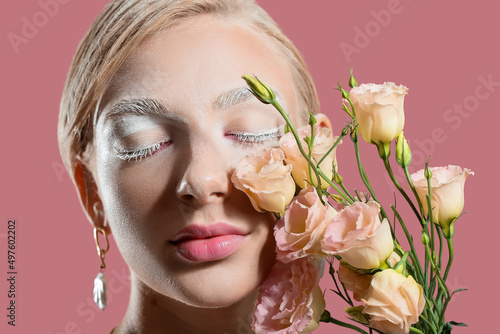 Beautiful young woman with ...