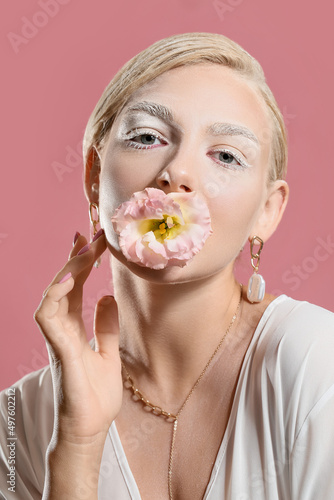 Beautiful young woman with ...