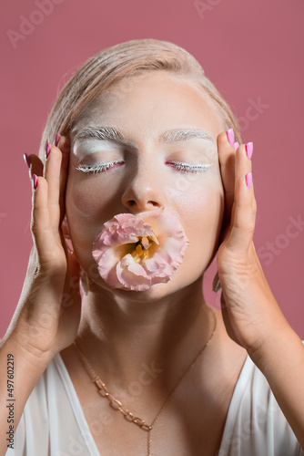 Beautiful young woman with ...