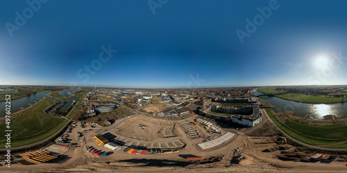Ready for VR real estate project PUUR21 wide 360 panoramic view on new housing construction site part of urban development plan Noorderhaven neighbourhood at midday with clear blue sky photo