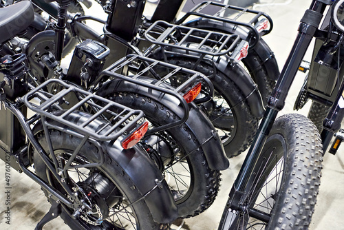 Black electric bicycles in shop