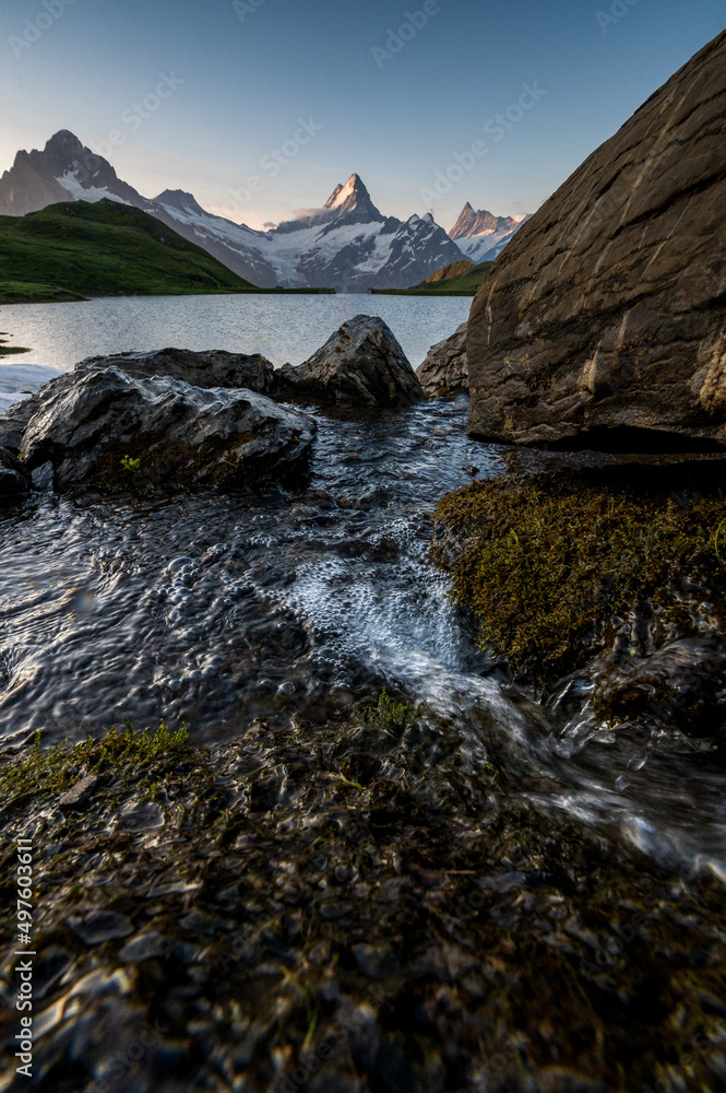 Fototapeta premium fresh water creek at Bachalpsee in the Swiss Alps near Grindelwald