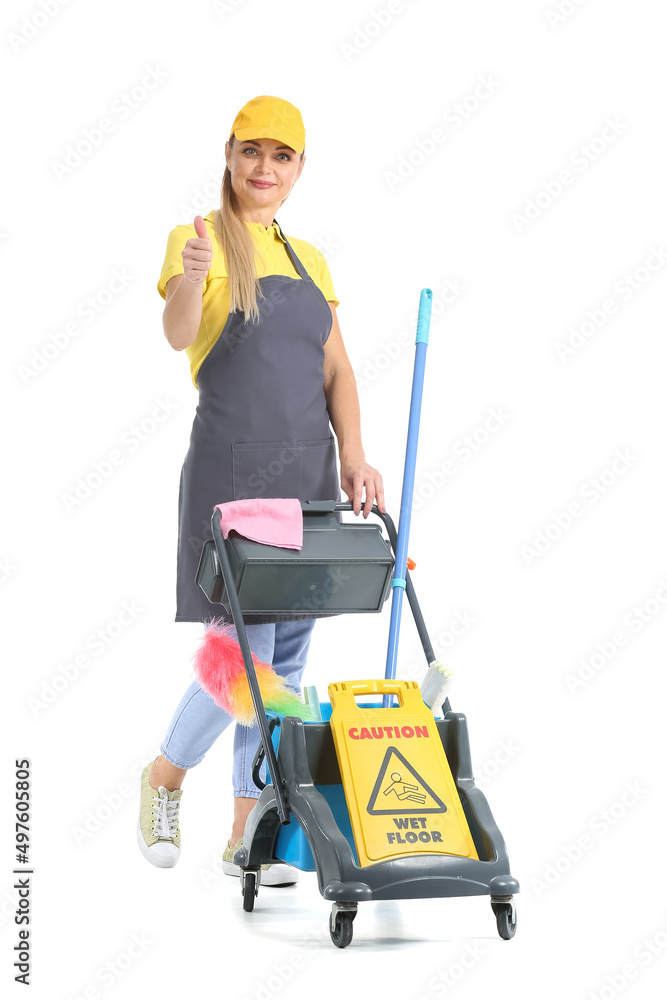 Worker of cleaning service with trolley showing thumb-up on white background Worker of cleaning service with trolley showing thumb-up on white background