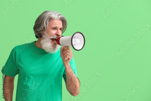 Senior man shouting into me...